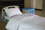 Hospital bed linen bleached white